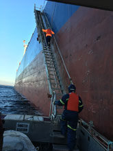 Boarding An Oil Tanker, just another place we install scaffolding.