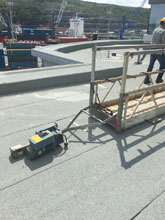 Preparing swing stage for installation.